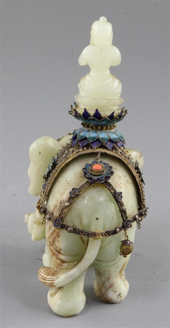 A Chinese celadon jade and filigree work group of Buddha riding an elephant, early 20th century, total height 14.5cm, length 9.8cm